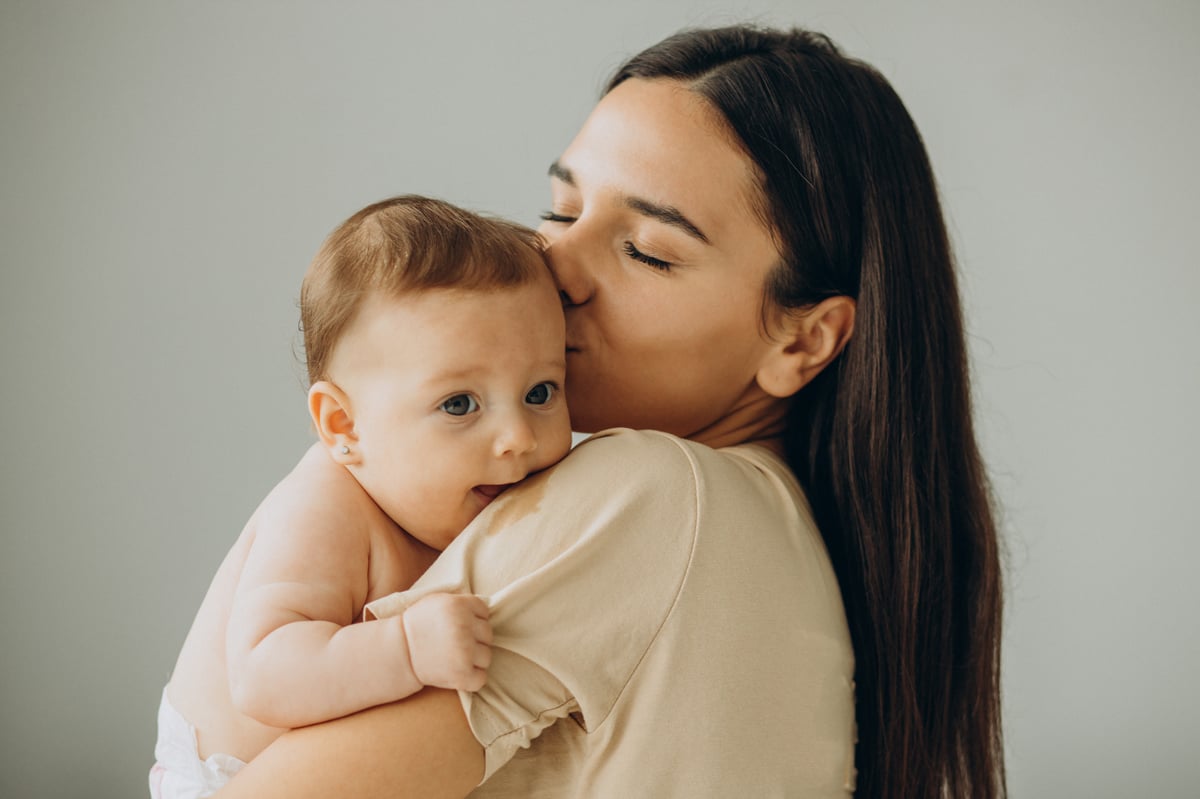 mother-with-her-baby-girl-home